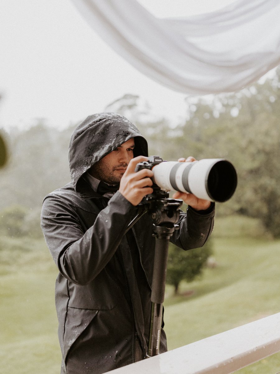 Sean, director and cinematographer at Creative Flow Studios, beside a cinema camera rig